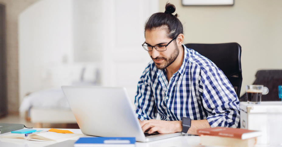 man researching on computer