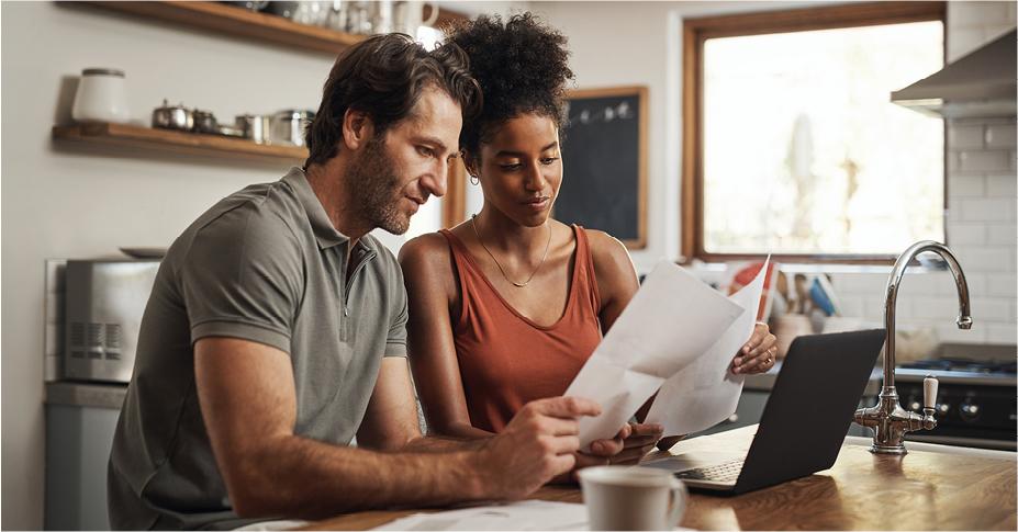 Couple reviewing updated tax brackets